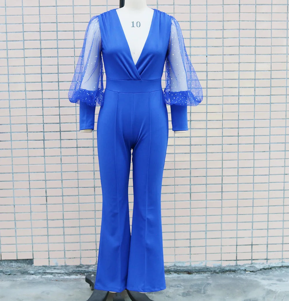 Jumpsuit mit Glitzer und weiten Beinen